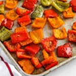 close up of cooked Roasted Bell Peppers on a baking sheet