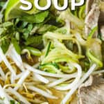 Low Carb Asian Noodle Soup in a grey bowl with writing.