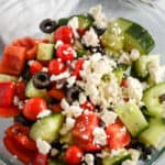 greek salad in a bowl with feta cheese