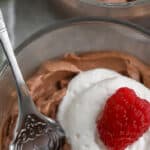 chocolate mousse in glass dish with spoon with text