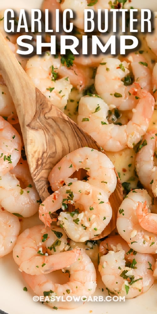 wooden spoon scooping butter garlic shrimp with text