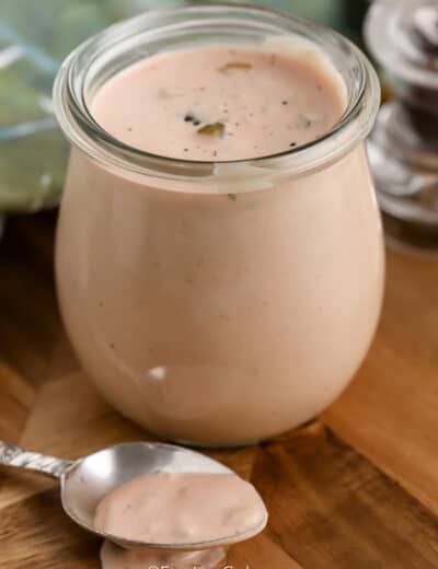 Keto Thousand Island Dressing in a jar with a spoon