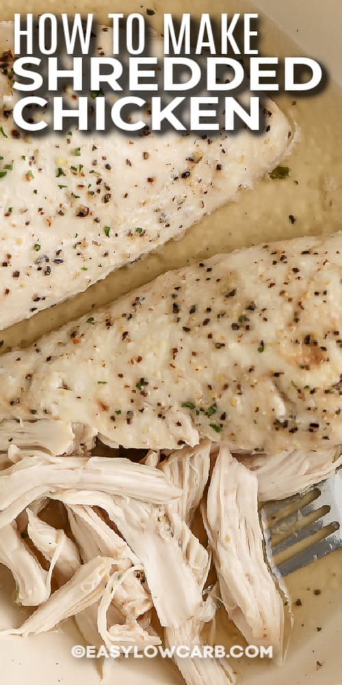 shredded chicken breasts and a fork in a dish with text