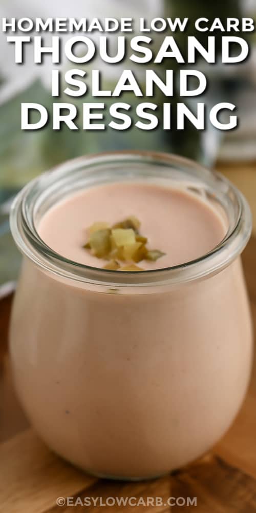 Keto Thousand Island Dressing in a jar with diced pickles on top with text