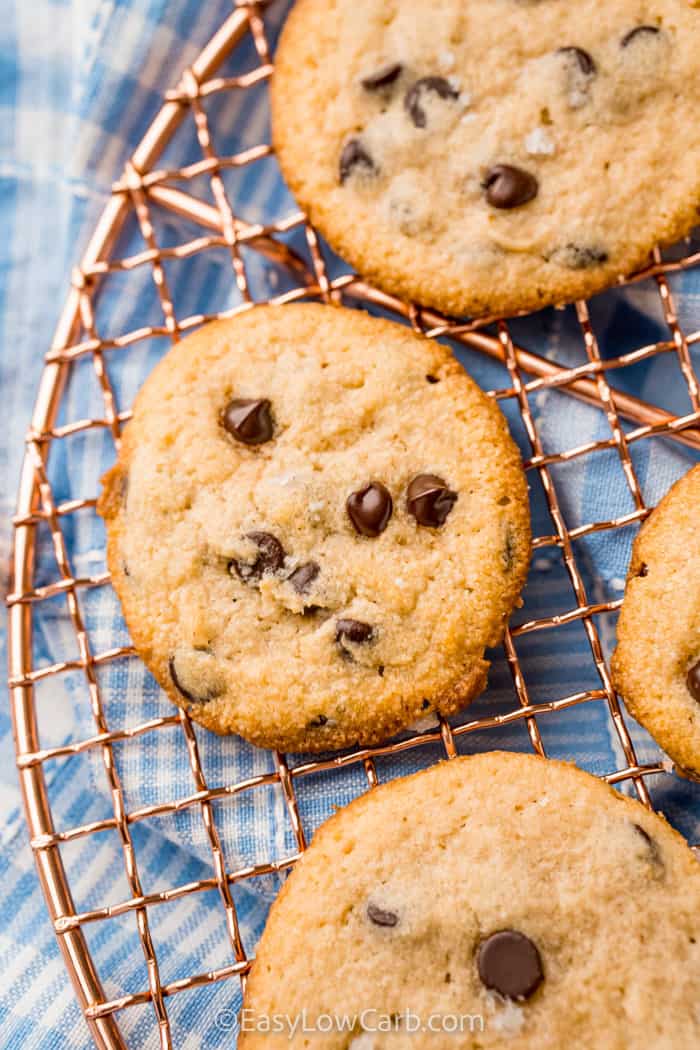 close up of cooked Keto Chocolate Chip Cookies on a cooling rack