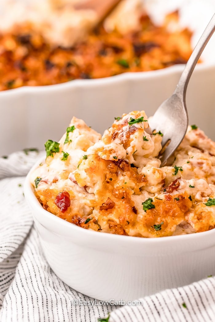 metal fork in a bowl of keto mac and cheese