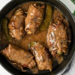 Beef Rouladen in a frying pan with gravy