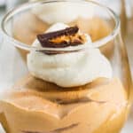 Chocolate Peanut Butter Mousse in a clear glass with writing