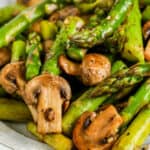 Sautéed Asparagus and Mushrooms on a plate with text