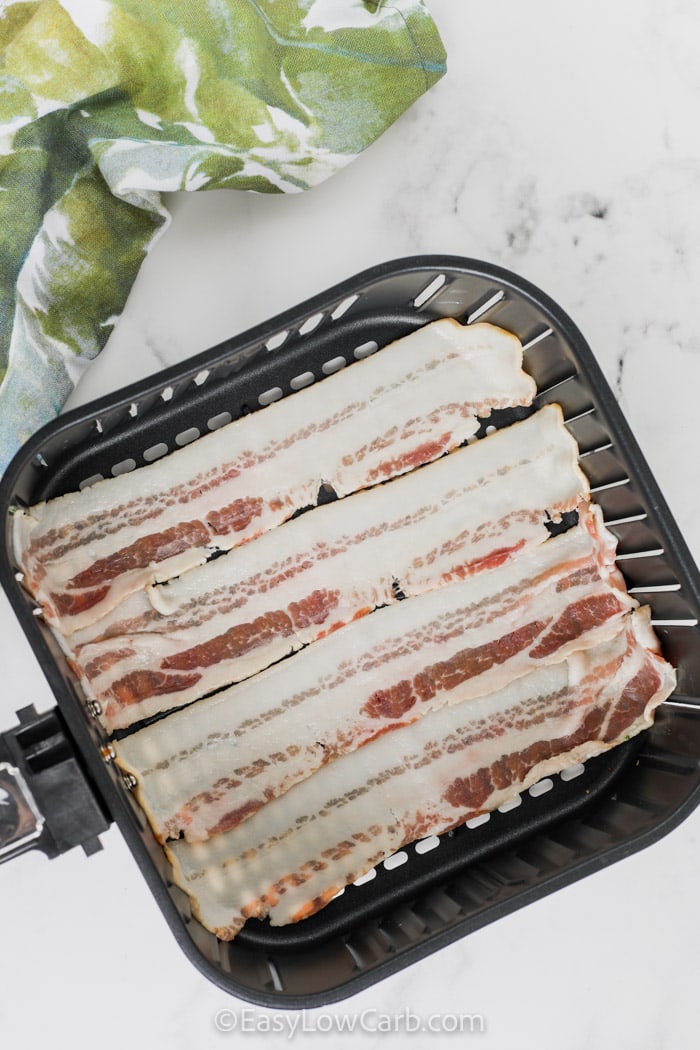 bacon in an air fryer before cooking to make Air Fryer Bacon