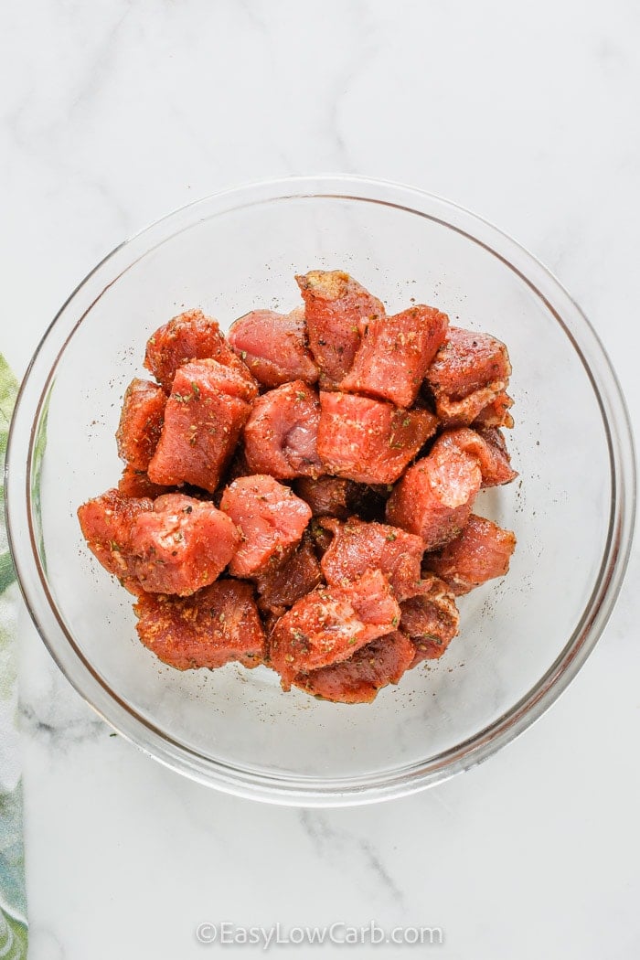 seasoned pork in a bowl for Cajun Pork Bites