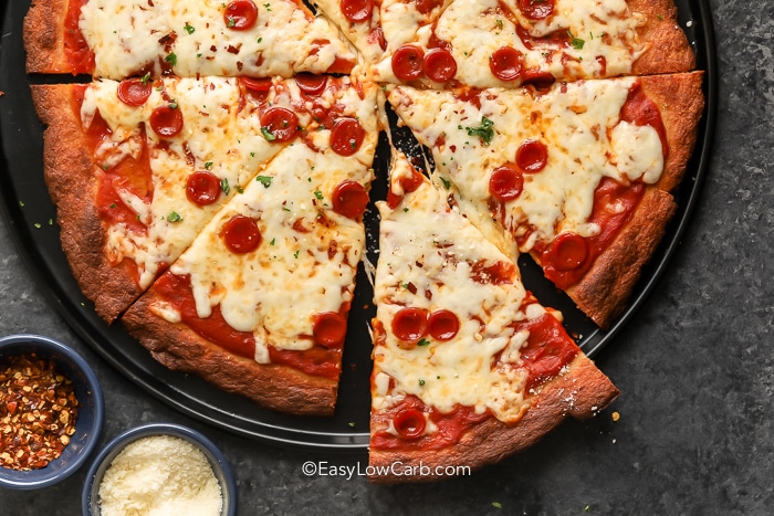 Baked Fathead Pizza Crust with pepperoni and cheese, garnished with parsley