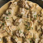low carb beef stroganoff in a sauce pan with writing