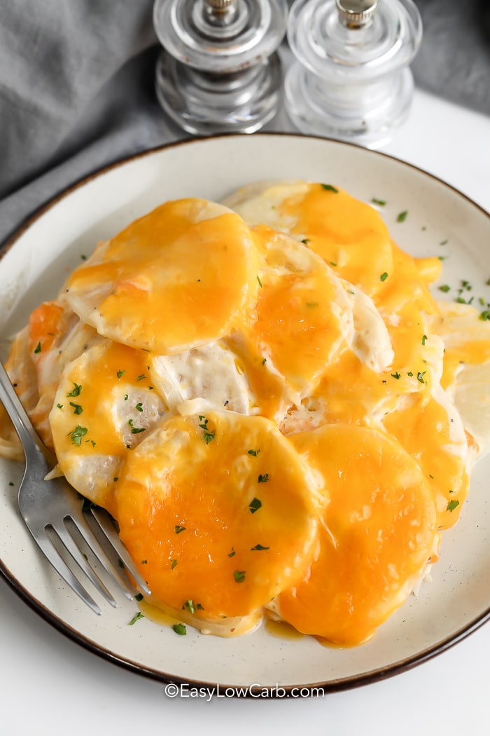 Keto Scalloped Potatoes on a plate with a fork