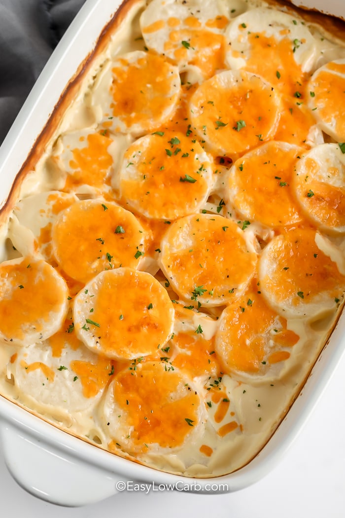 Keto Scalloped Potatoes in a white casserole dish