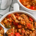 Low Carb Stovetop Chili in a bowl with a spoon and writing