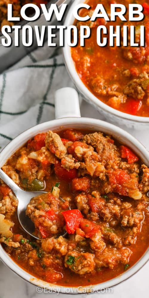 Low Carb Stovetop Chili in a bowl with a spoon and writing