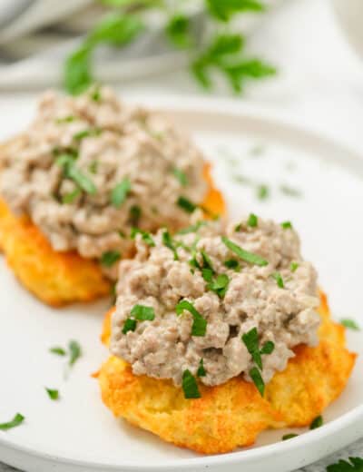 Keto biscuits topped with sausage gravy