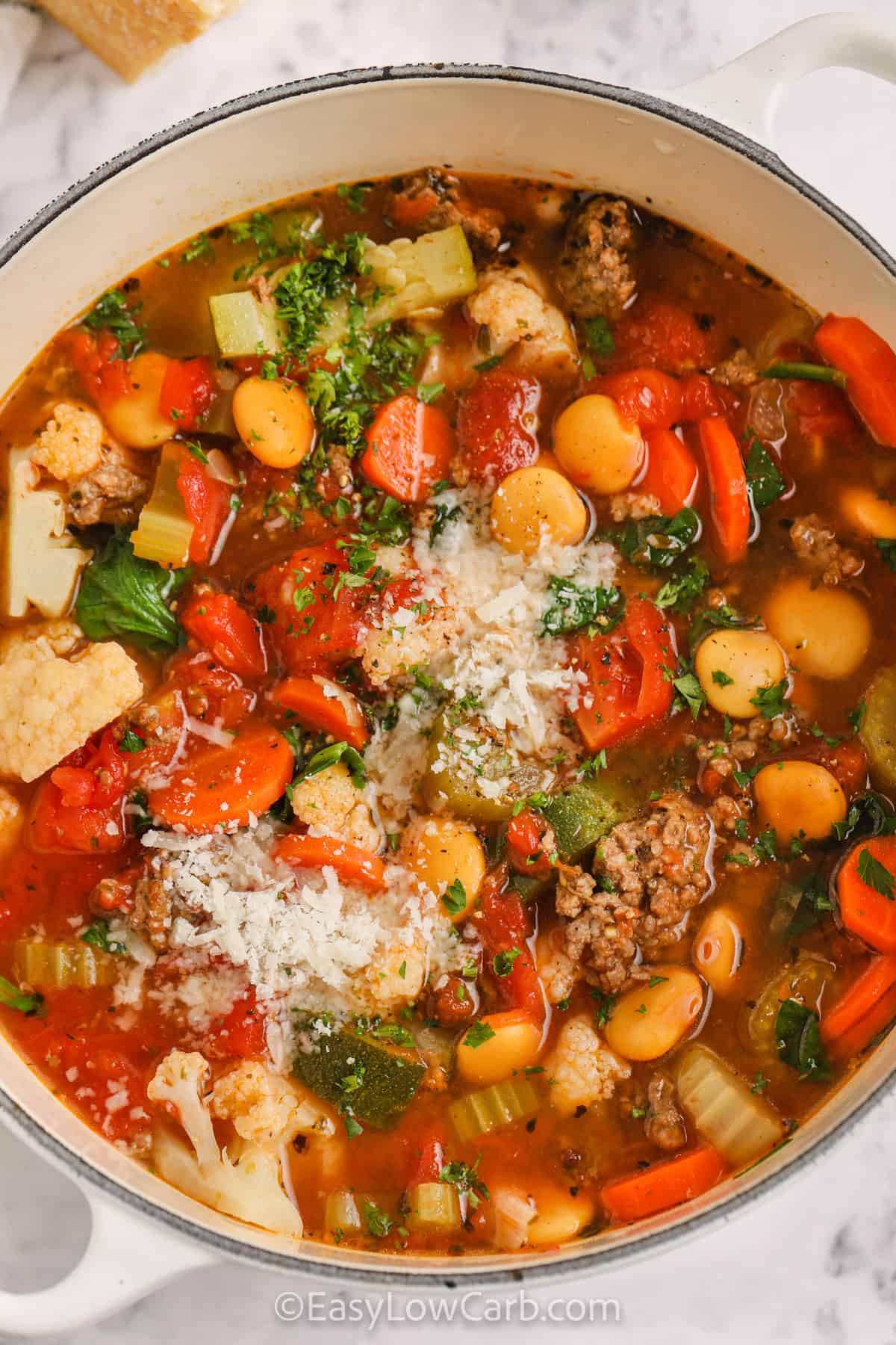 Keto Minestrone Soup with parmesan cheese on top