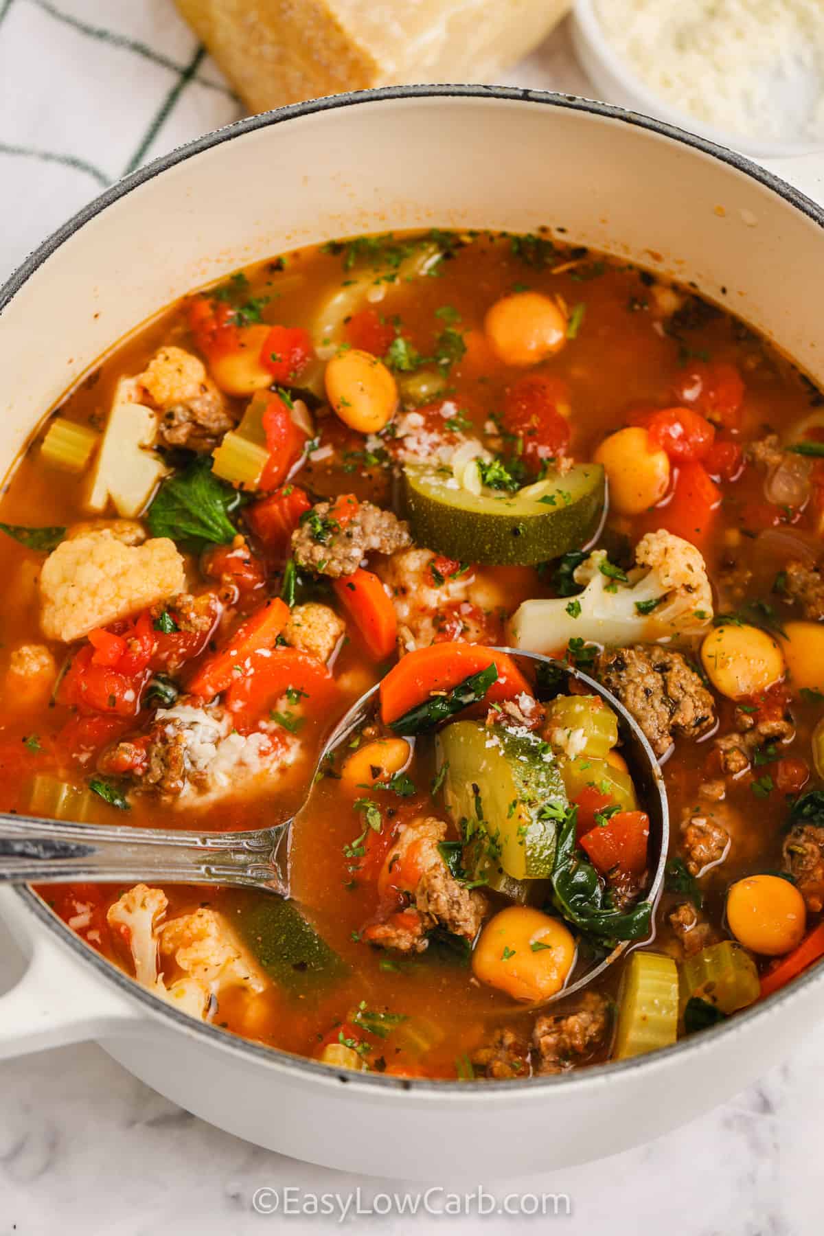 Keto Minestrone Soup in a pot with a ladle