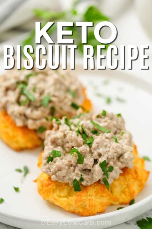 Keto biscuits topped with sausage gravy with a title