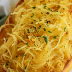 Air Fryer Spaghetti Squash with a fork and a title