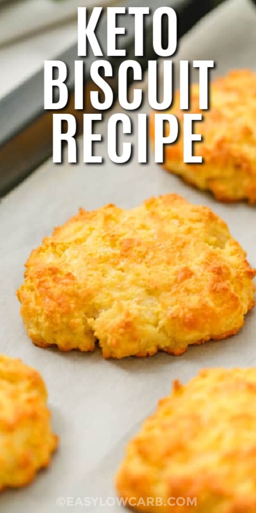 Keto biscuits baked on a baking tray with a title