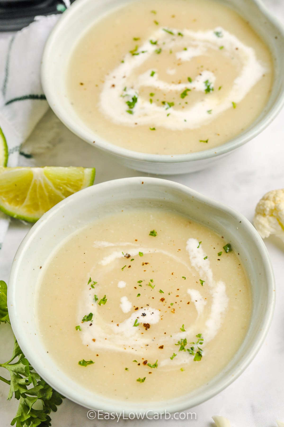 two bowls full of Curried Cauliflower Soup