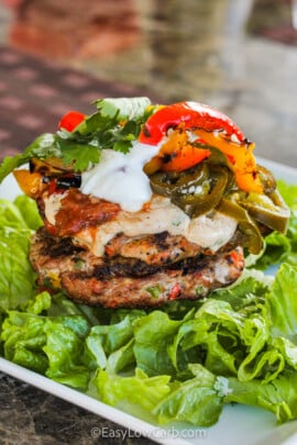 Fajita Grilled Turkey Burgers on a bed of lettuce with toppings