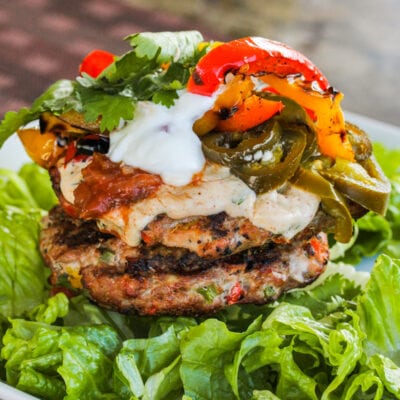 Fajita Grilled Turkey Burgers on a bed of lettuce with toppings