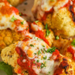 Cauliflower Parmesan on a plate with a title