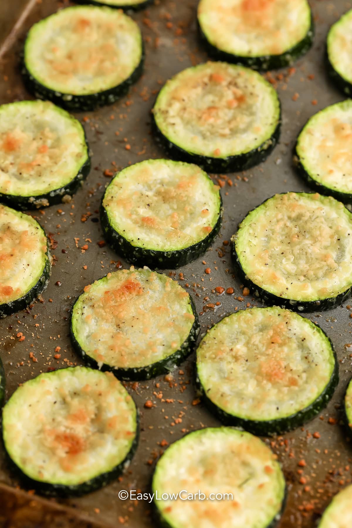 close up of baked zucchini on a tray