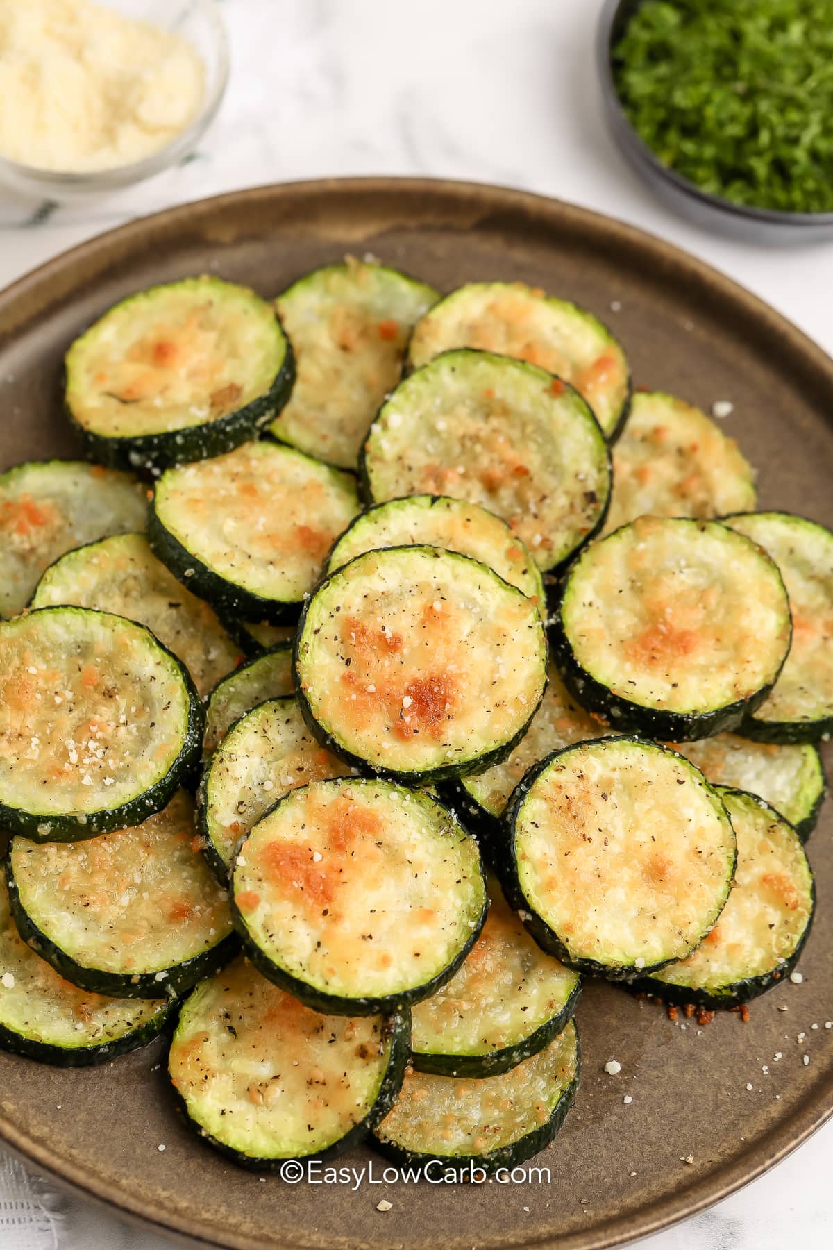 baked parmesan zucchini on a plate