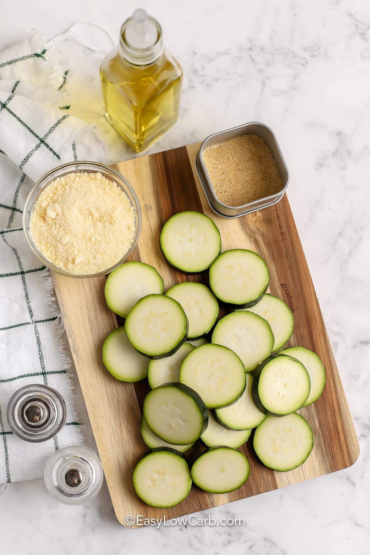sliced zucchini on a cutting board with spices