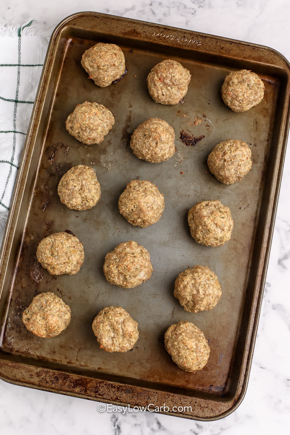 cooked turkey meatballs on a baking tray