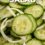cucumber onion salad in a bowl with text
