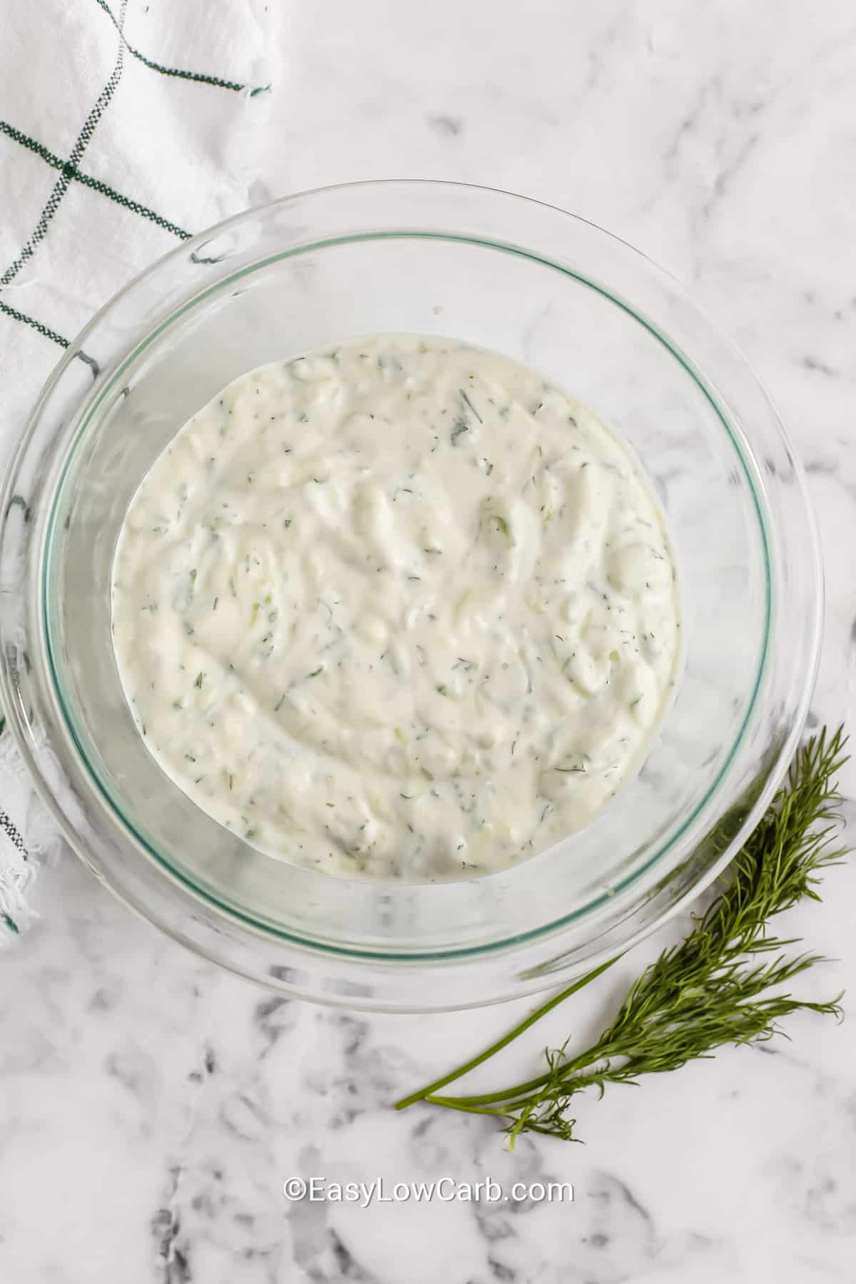 homemade tzatziki sauce in a clear bowl