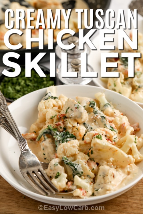 creamy tuscan chicken skillet in a bowl with text