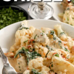 creamy tuscan chicken skillet with text