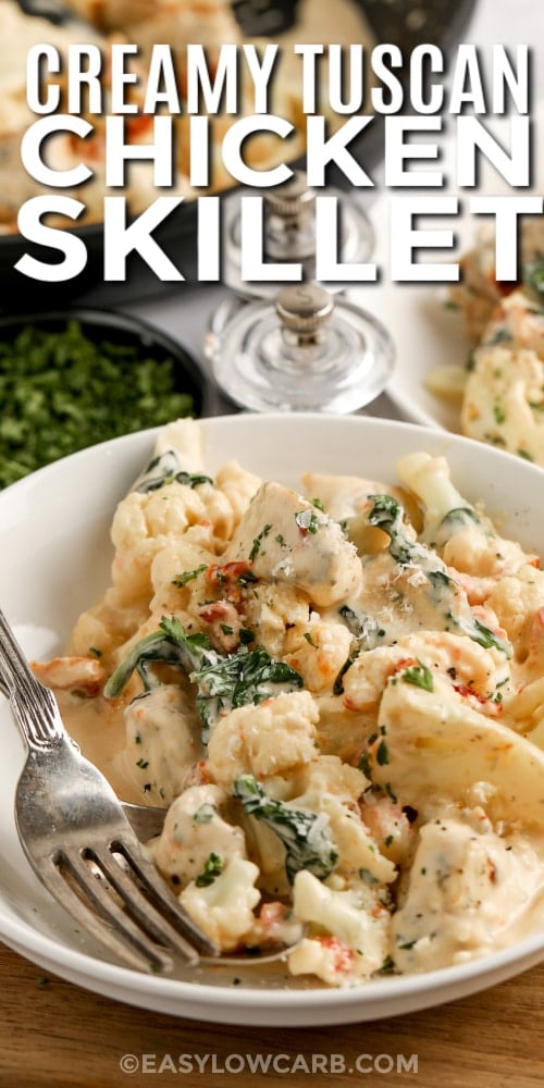 creamy tuscan chicken skillet with text