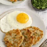 turkey breakfast sausage patties on a plate with eggs