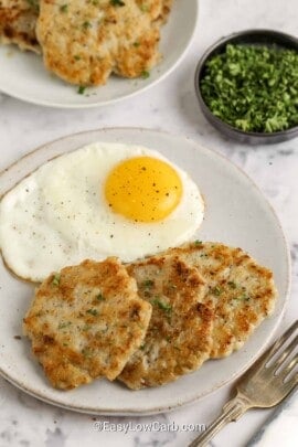 turkey breakfast sausage patties on a plate with eggs
