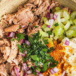 close up of Easy Curry Tuna Salad ingredients in bowl with a title