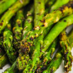 close up of Grilled Asparagus with a title