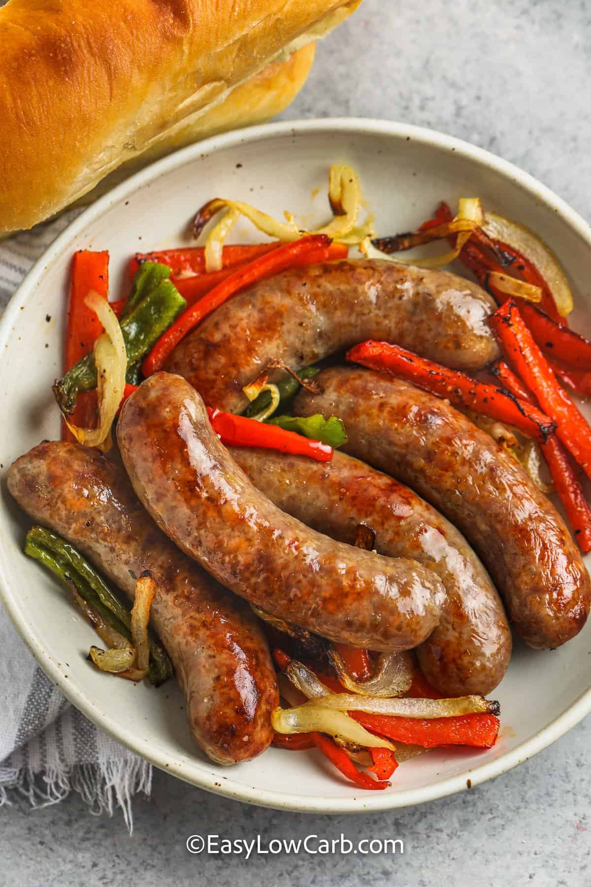 https://easylowcarb.com/wp-content/uploads/2022/08/Air-Fryer-Brats-with-Peppers-and-Onions-EasyLowCarb4.jpg