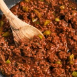 Keto Sloppy Joes in a pan with a wooden spoon