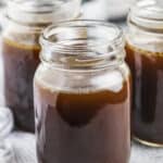 beef bone broth recipe in clear jars