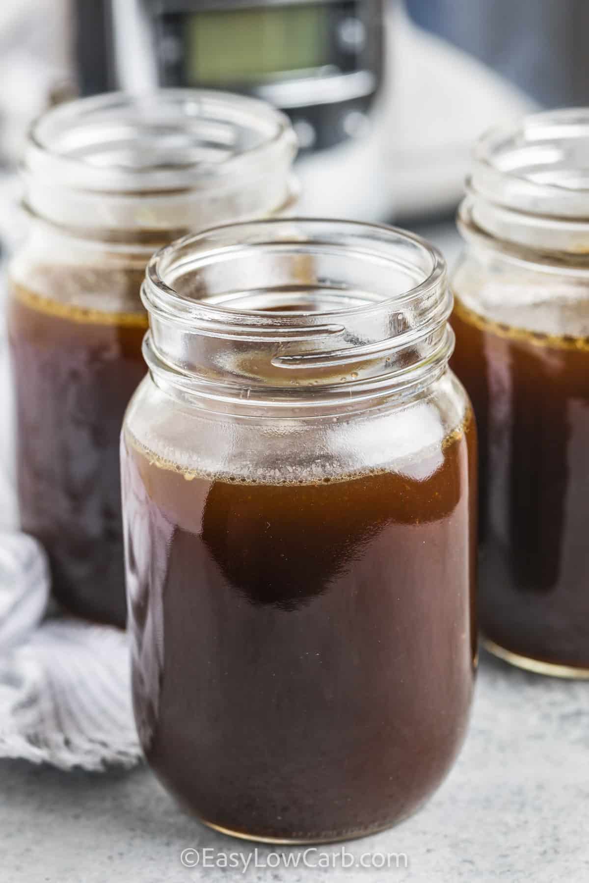 beef bone broth recipe in clear jars