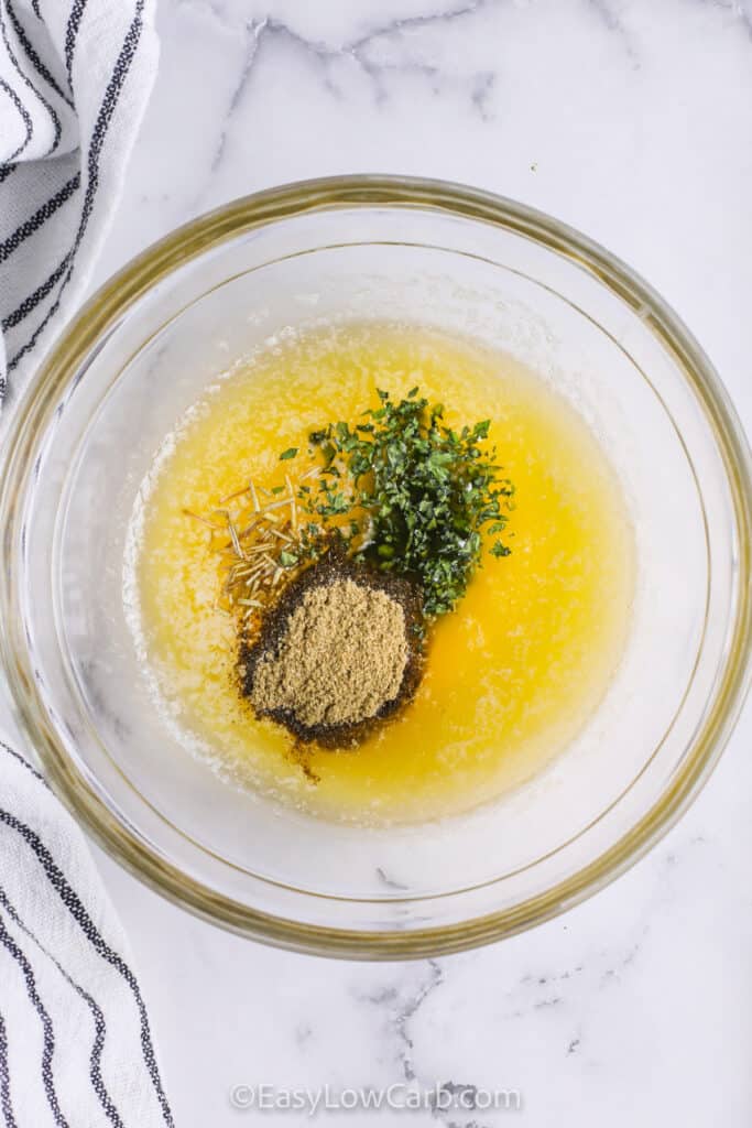 ingredients in a bowl to make dressing for Cauliflower Stuffing