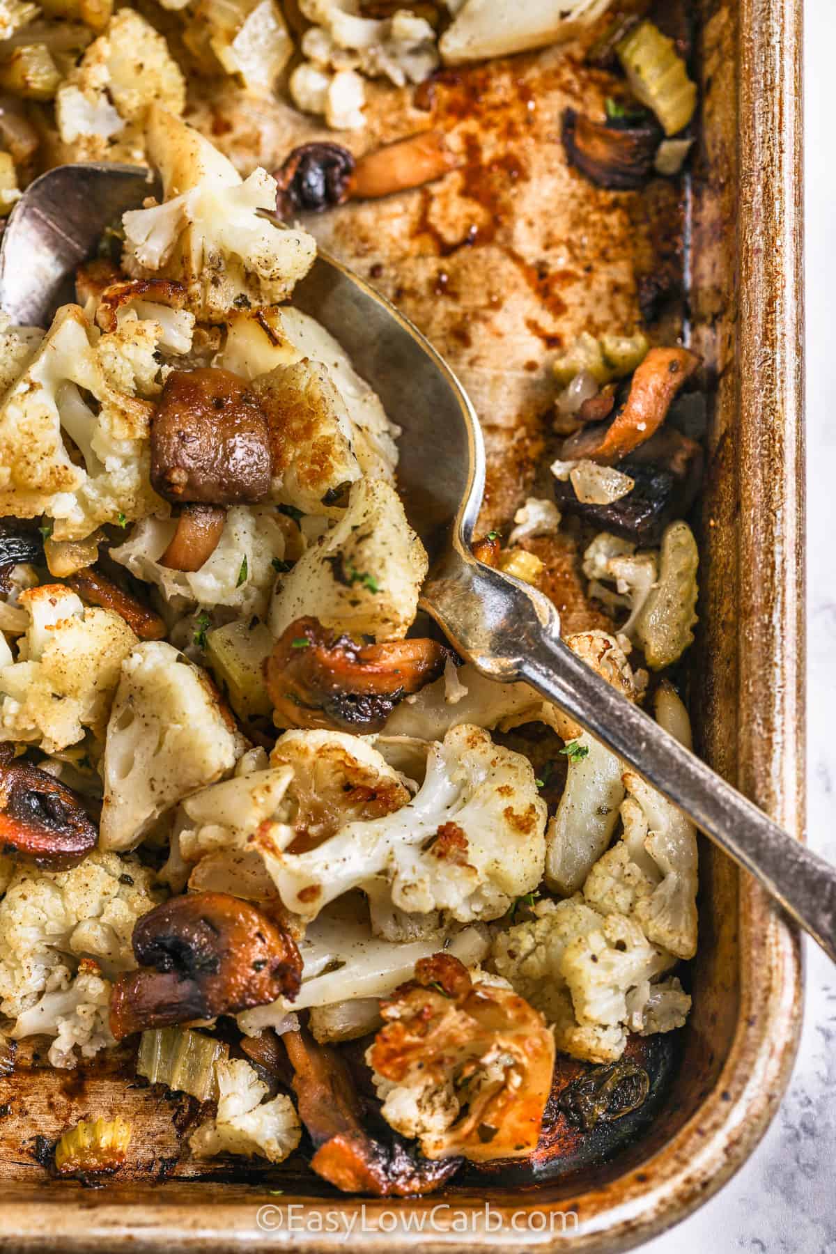 close up of Cauliflower Stuffing cooked on a baking sheet
